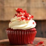 Image of one red velvet cupcake on a table