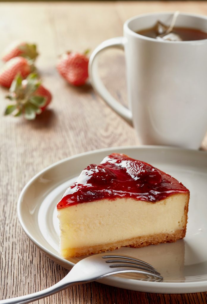 Image of piece of strawberry cheesecake on plate